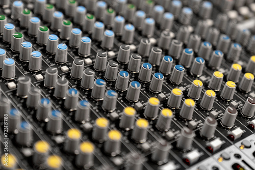 Mixer control. Music engineer. Backstage controls on an audio mixer  Sound mixer. Professional audio mixing console with lights  buttons  faders and sliders. sound check for concert. 