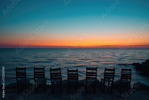 Chairs strategically placed along the coast  inviting conversations with the sea