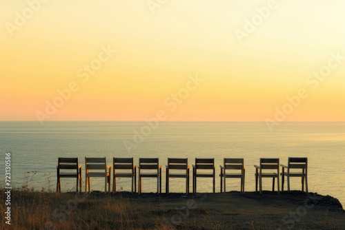 Chairs strategically placed along the coast, inviting conversations with the sea