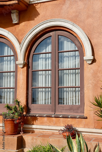 Arched French doors lead out onto the patio