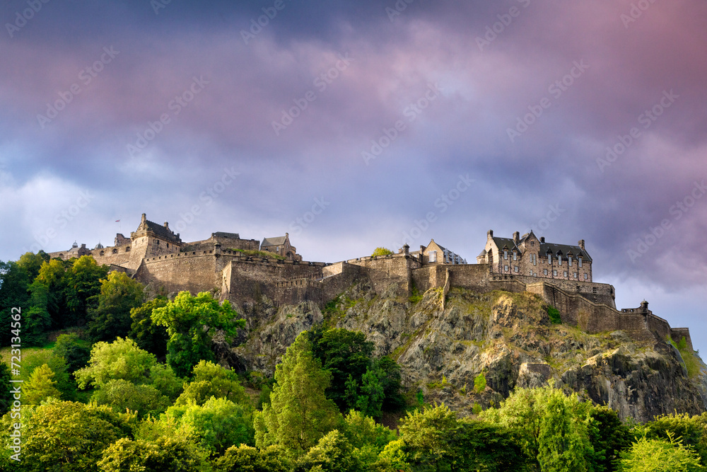 Edinburgh Castle, perched on its rock above the trees on Princes Street Gardens.