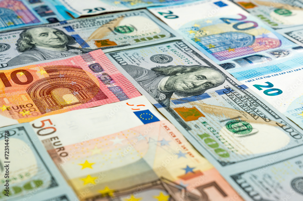 Background made of dollar and euro banknotes Background made of dollar and euro banknotes