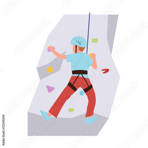 Preteen boy child cartoon character well-equipped climbing wall at indoor mountaineering gym
