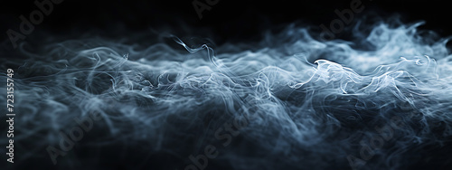a close up image of the smoke in a black background i