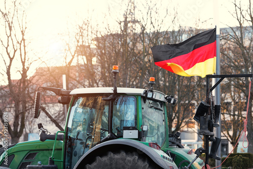 Farmers union protest strike against government Policy in Germany Europe. Tractors vehicles blocks city road traffic. Agriculture farm machines Magdeburg central Domplatz square photo