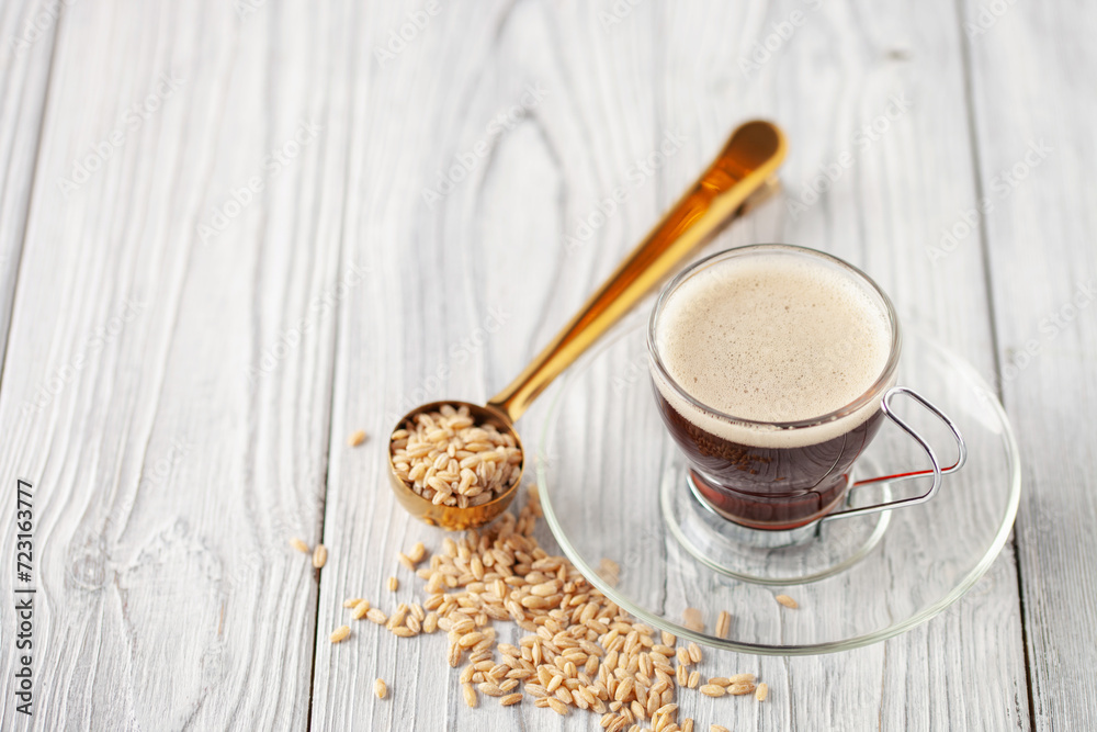Cup with coffee barley with barley grains. Healthy herbal drink for immunity. Coffee alternatives Cup with coffee barley with barley grains. Healthy herbal drink for immunity. Coffee alternatives