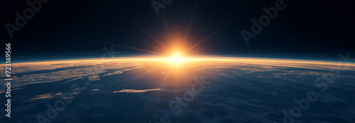 a light from the sun shines above the horizon in
