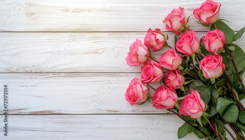 womens day background  bundle of rose flowers in the white wooden background