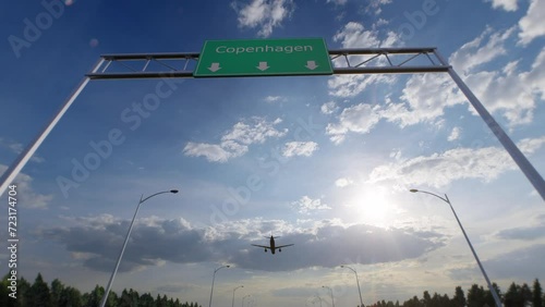 Copenhagen City Road Sign - Airplane Arriving To Copenhagen Airport Travelling To Denmark photo