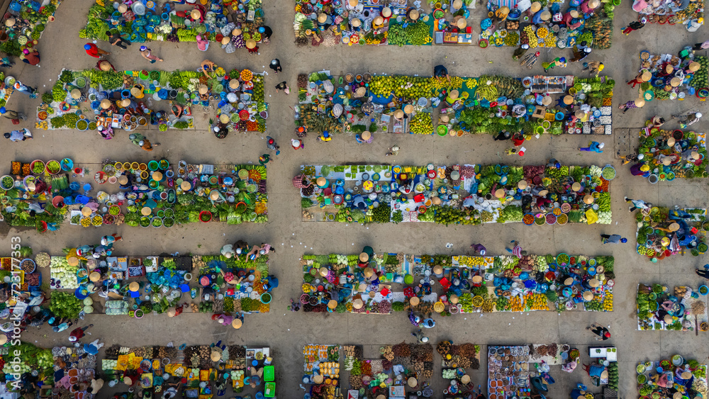Aerial view of busy local daily life of the morning local market in Vi Thanh or Chom Hom market, Vietnam