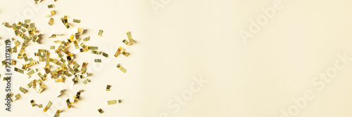 Beige background with gold sparkles particles for banner design of Holiday, wedding , cosmetic backdrop
