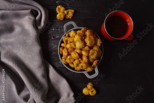 Sweet emping is a type of snack or snack made from melinjo or belinjo seeds. Sweet Emping has a slightly bitter and sweet taste due to the addition of sugar caramel. photo