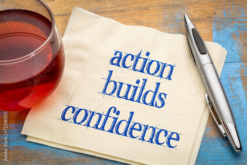 action builds confidence - inspirational note on anpkin with tea, personal development concept