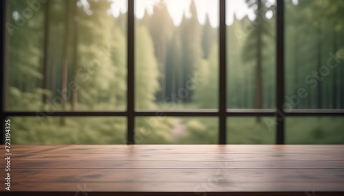 Empty wooden table with green trees background