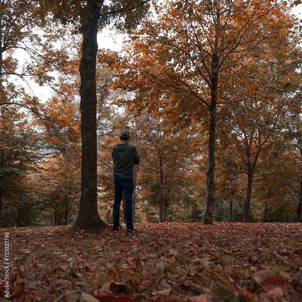 man trekking in the mountain in autumn season