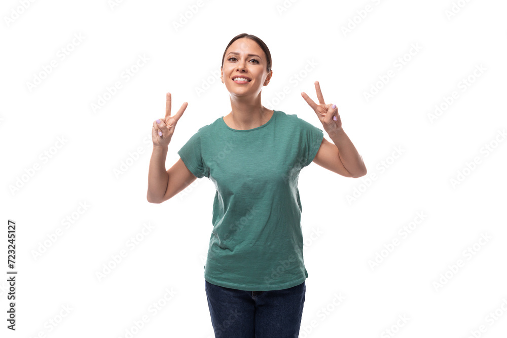 young slim brunette caucasian woman in a casual look in the studio young slim brunette caucasian woman in a casual look in the studio