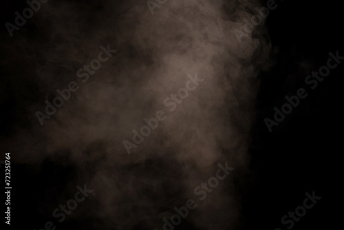 White steam on a black background.