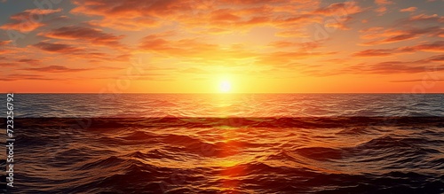 Wide panorama of beautiful sunset over calm sea.