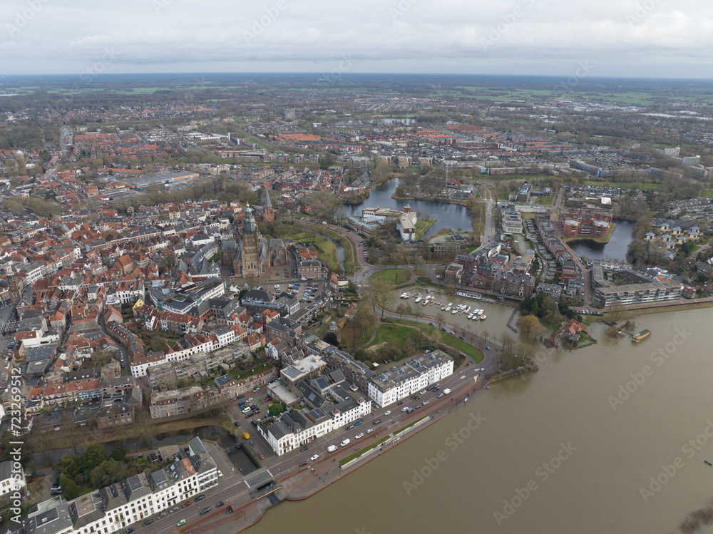 Aerial overview of the city of Zutphen, along the river Ijssel in Gelderland, The Netherlands. Birds eye aerial drone view in the Dutch province of Gelderland.