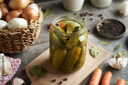 Homemade cucumber pickles in a glass jar