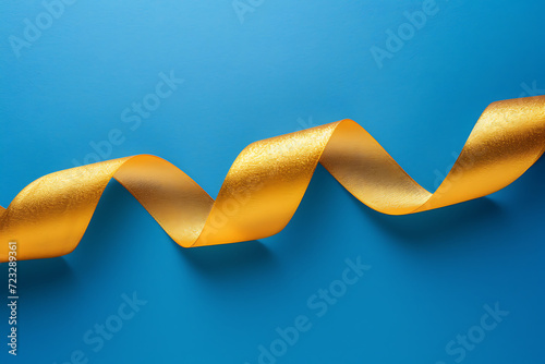 Golden ribbon on blue background.