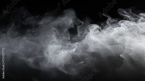Close up shot of smoke on a black background. Suitable for various design projects and artistic concepts