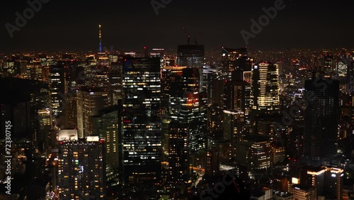 Wallpaper Mural Aerial View of Japanese skycrapers from Roppongi, Tokyo, Japan at night. Scenery of central downtown area with Tokyo sky tree and business district. High quality 4k footage Torontodigital.ca