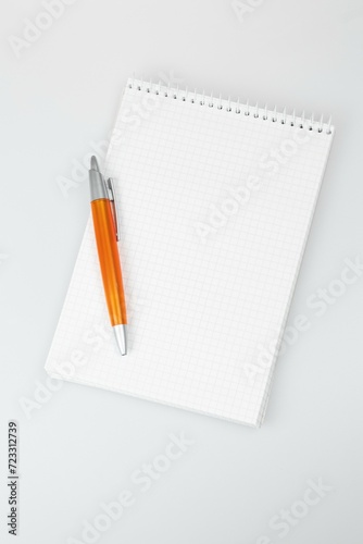 notepad and pencil, notebook and pen, notebook and pencil