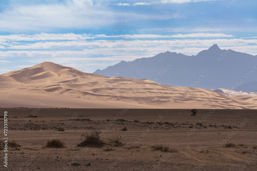Majestic dunes of Erg Tin Abaro under blue sky Majestic dunes of Erg Tin Abaro under blue sky