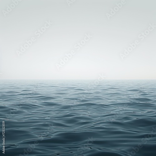  a large body of water with a lone boat in the middle of the water and a foggy sky in the backgrouund of the picture, with only one lone boat in the foreground.