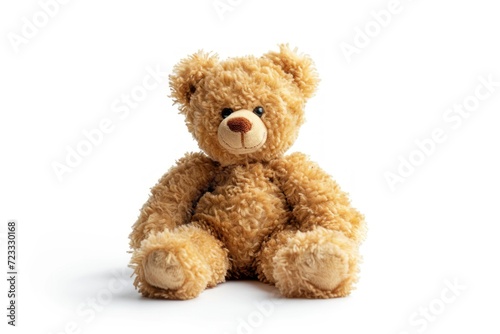 Soft toy bear alone on white background