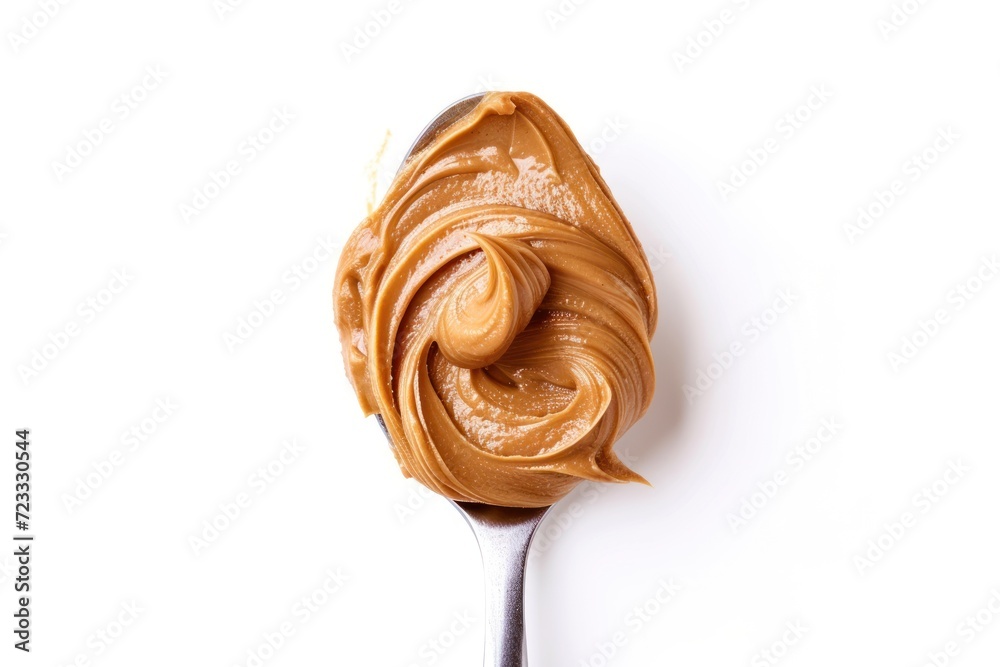 Tasty peanut butter on spoon white background Tasty peanut butter on spoon white background