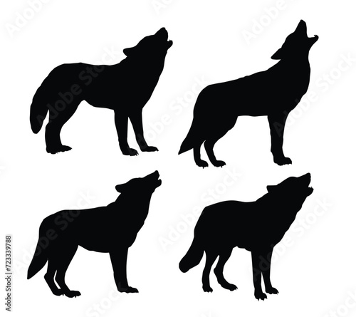Set of silhouettes of barking wolves.