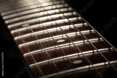 electric guitar fretboard macro closeup