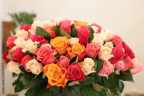 Bouquet of beautiful rose flowers on blurred background  closeup