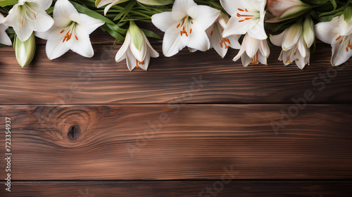 Blooming white Easter lilies wooden banner background copy space. Eastertide flowers spring image backdrop empty. April resurrection paschal sunday concept composition top view, copyspace