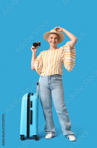 Mature woman with photo cam...