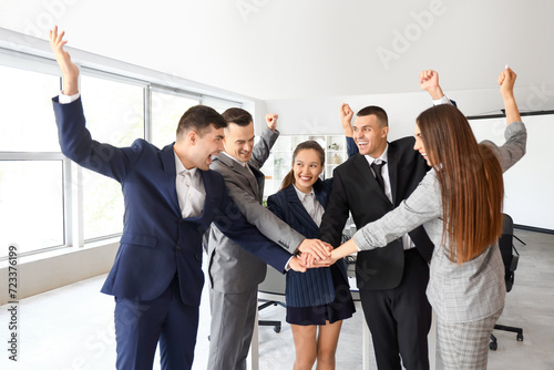 Business people putting han...