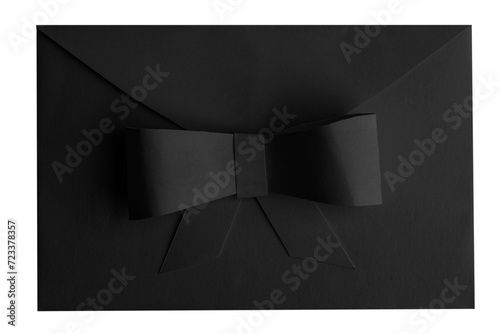 Black envelope with a bow on a blank background.