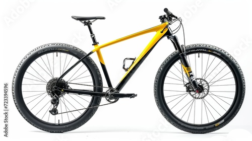 yellow black 29er mountainbike with thick offroad tyres. bicycle mtb cross country aluminum, cycling sport transport concept isolated on white background  photo