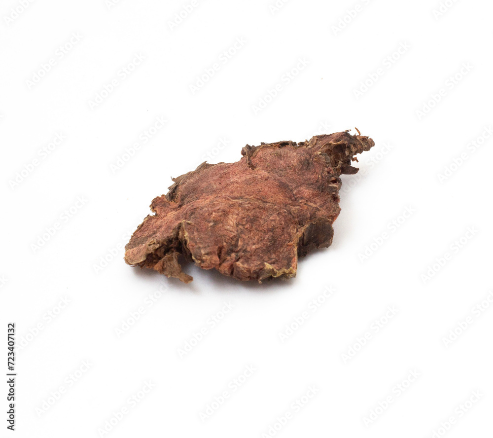finely chopped dried Rhodiola rosea root close-up on a white isolated background