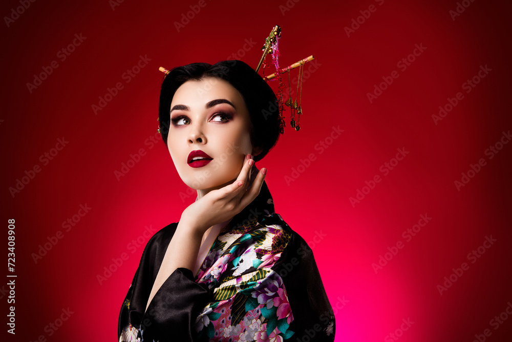 Photo of chinese lady dressed floral clothes touch face looking empty space isolated on red gradient color background Photo of chinese lady dressed floral clothes touch face looking empty space isolated on red gradient color background