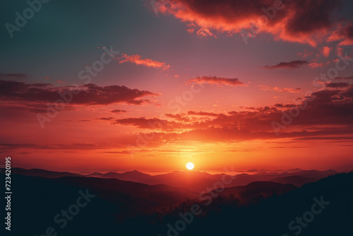 Monochromatic backdrop, sunset over the forested mountain landscape