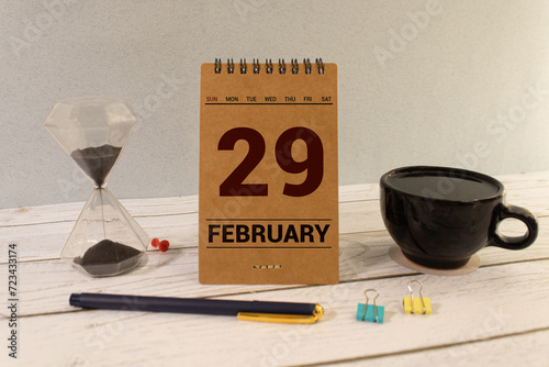 February 29 calendar date text on wooden blocks with customizable space for text or ideas. Copy space and calendar concept photo