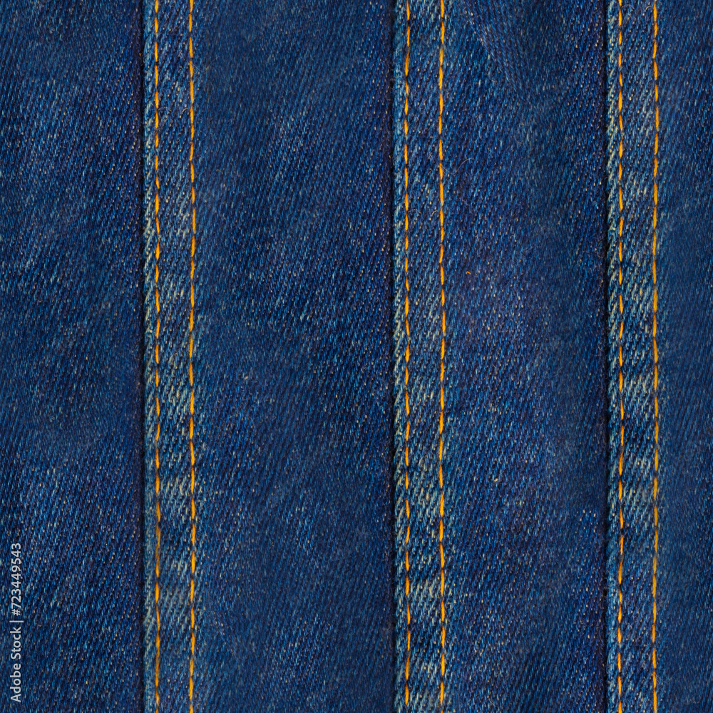 Seamless texture photo of vertical blue stitched denim or jeans material. Seamless texture photo of vertical blue stitched denim or jeans material.