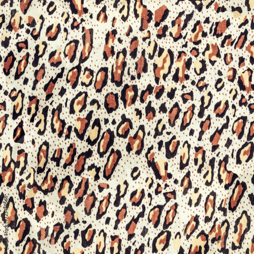 Seamless texture photo of leopard patterned cloth material.