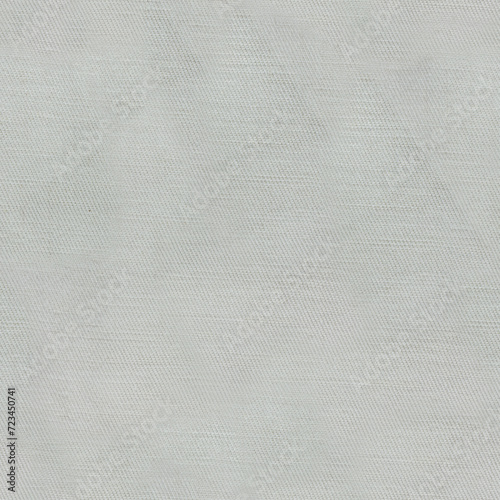 Seamless texture photo of white or gray colored denim or jeans material.