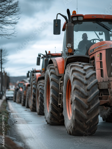 A line of tractors blocking the street. french farmers. Agricultural workers protesting against tax increases