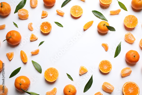 Frame made of fresh ripe and space for text on white background, top view. Citrus fruit