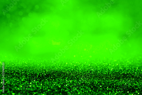 St. Patrick day. Shiny green glitter, closeup. Bokeh effect